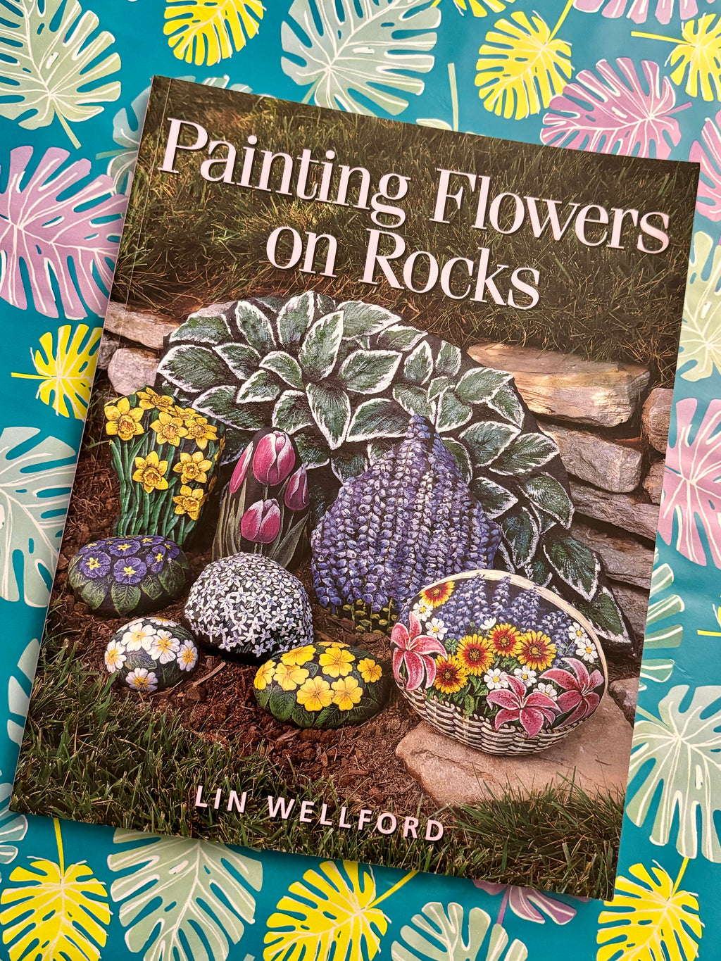 Painting Flowers on Rocks- By Lin Wellford