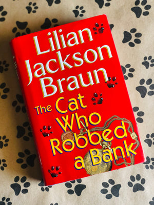 The Cat Who Robbed a Bank by Lilian Jackson Braun